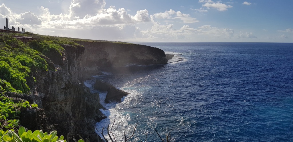 A picture of a cliff and the ocean in Sapian, representing the sentence I've been to Saipan